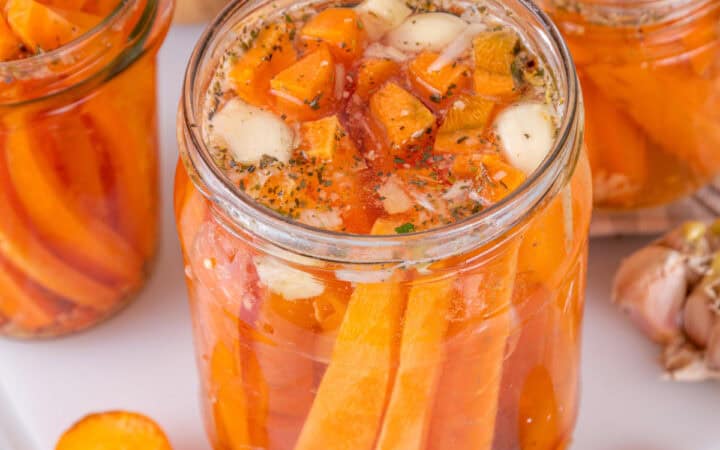 Pickled carrots in glass jars