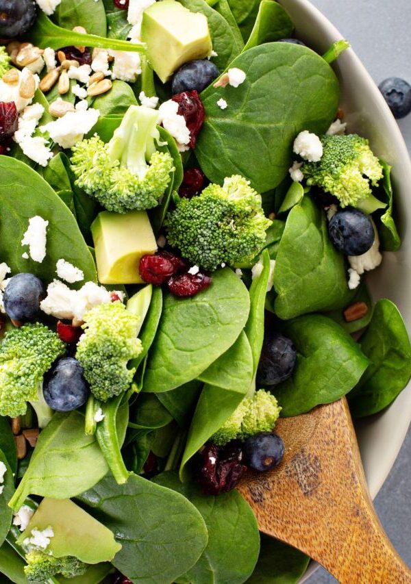 Close up image of blueberry salad with spinach