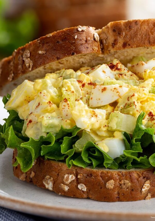 Close up image of an Egg Salad Sandwich on wheat bread