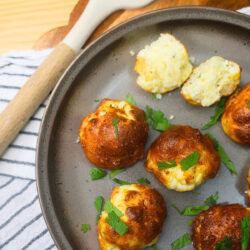 Air Fried Protein Cheese Bites on a plate with garnish