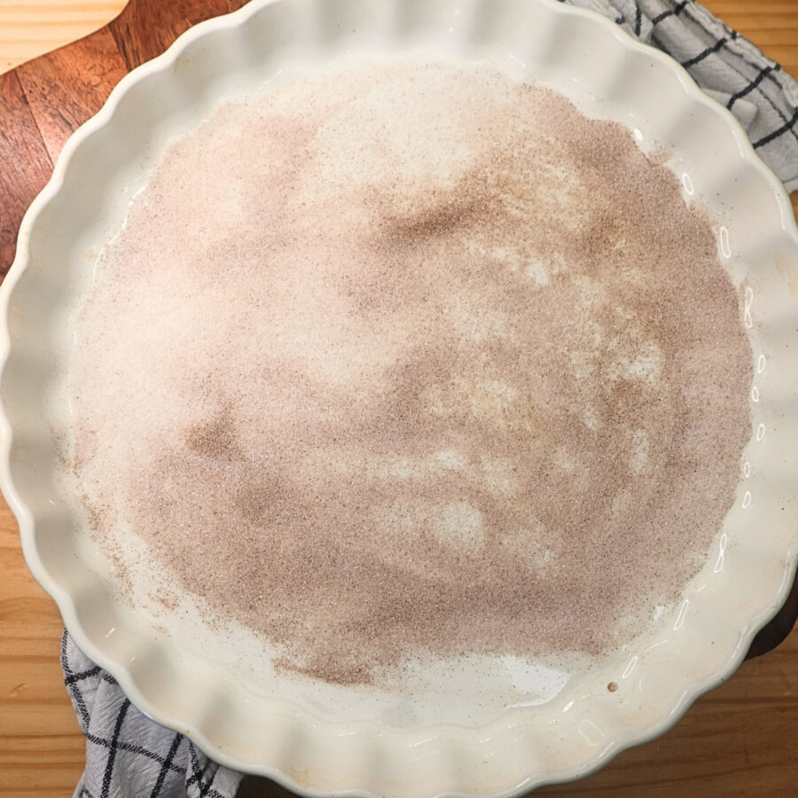 Cinnamon sugar in a white baking dish