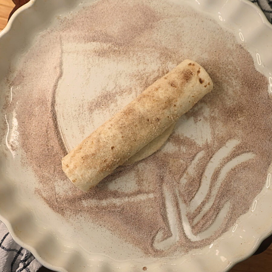 Apple Pie Taquitos rolled in cinnamon sugar