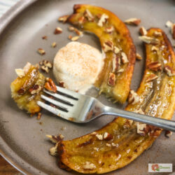 Banana cue Close up image of air fryer carmelized bananas on a plate with a bite on a fork