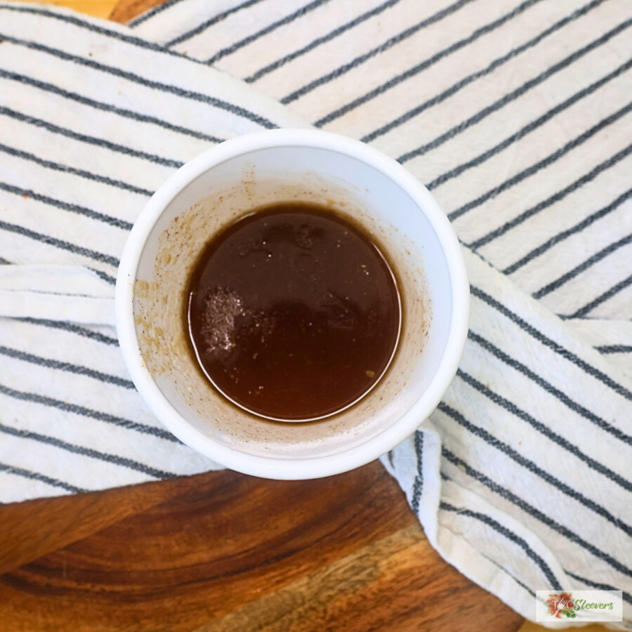 Cinnamon sugar butter topping in a small white bowl