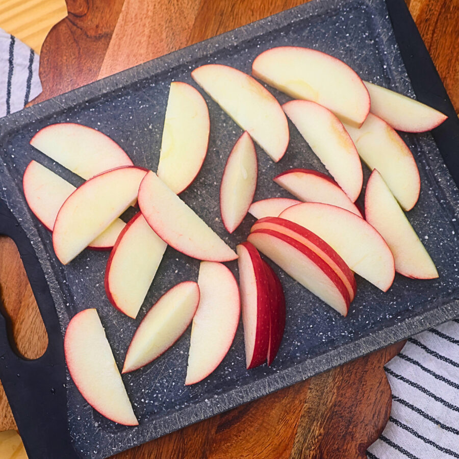 Sliced apples on a cutting board