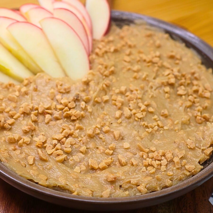 Apple Toffee Dip with sliced apples in it