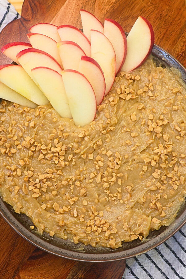 Overhead image of Apple Toffee Dip with sliced apples in it
