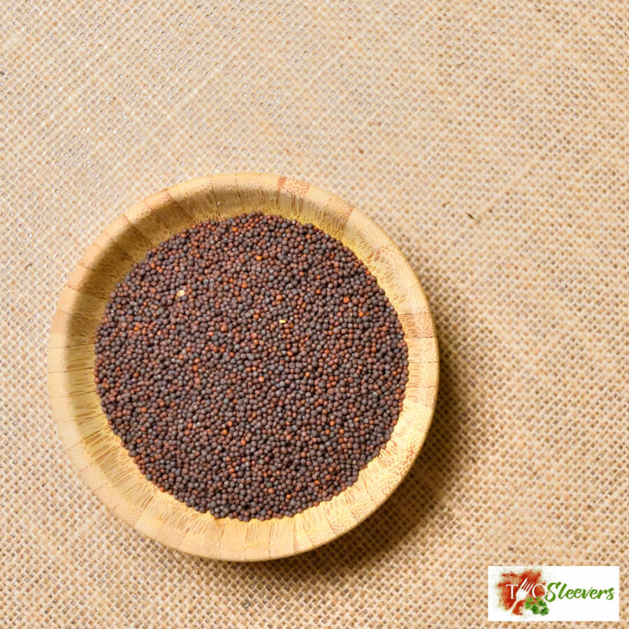 Overhead image of  Black Mustard Seeds in a wooden bowl