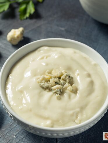 Close up image of blue cheese dressing in a bowl