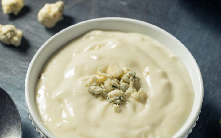 Close up image of blue cheese dressing in a bowl