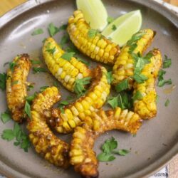 Close up image of Cajun Butter Corn Ribs on a plate