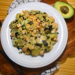 Overhead image of California Roll Cucumber Salad in a white bowl