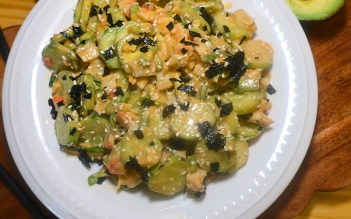 Overhead image of California Roll Cucumber Salad in a white bowl