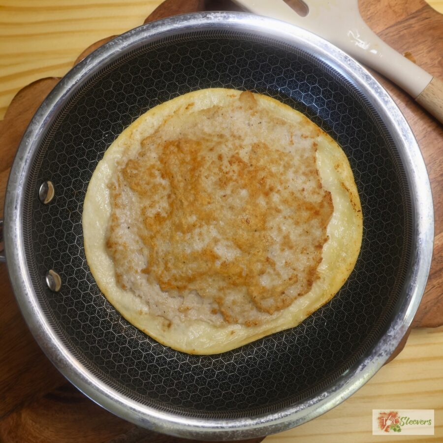 Cooked Chicken Smash Taco in a skillet
