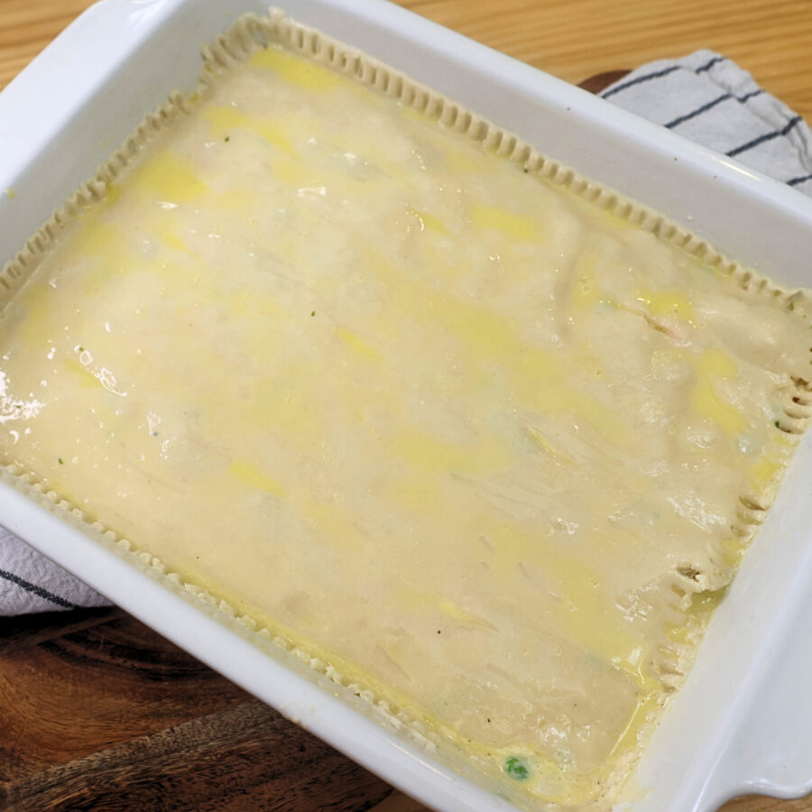 Chicken Pot Pie Casserole with an egg wash brushed over the top