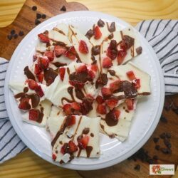 Overhead image of Chocolate Strawberry Yogurt Bark broken into pieces in a white bowl