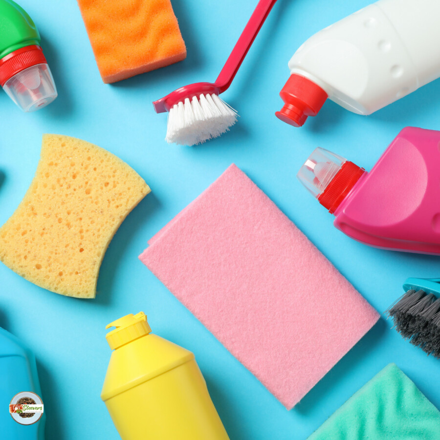 Cleaning supplies scattered on a blue surface