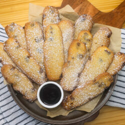 Overhead image of Cookie fries stacked on a plate with dipping chocolate