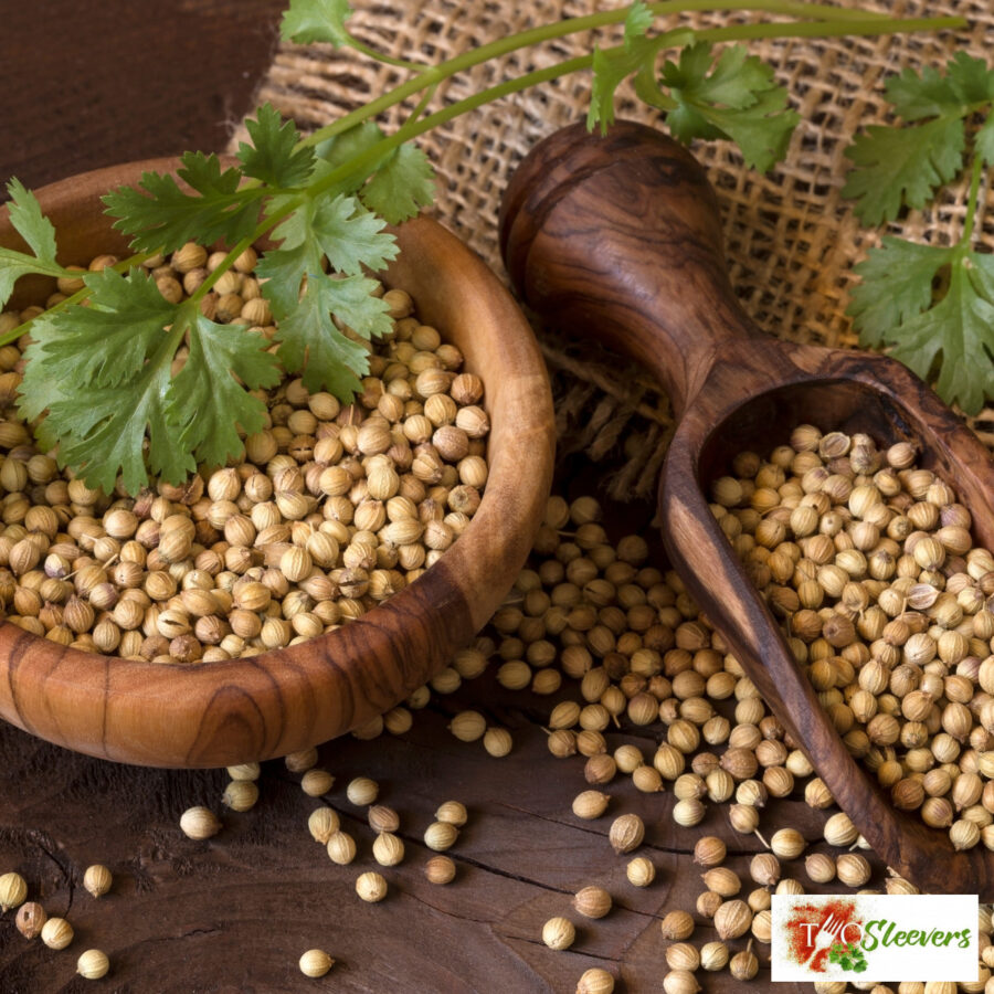 Coriander Seeds in a wooden bowl and scoop
