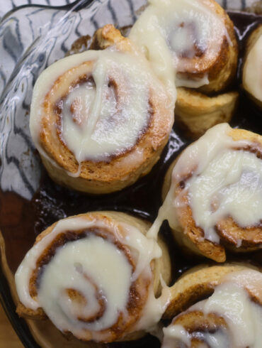 Close up image of cottage cheese cinnamon rolls in a pan