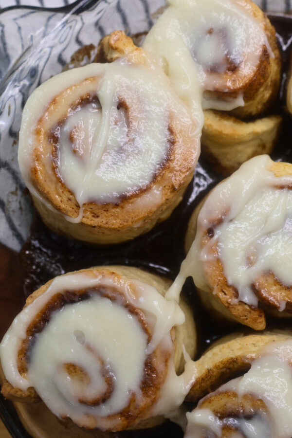 Close up image of cottage cheese cinnamon rolls in a pan