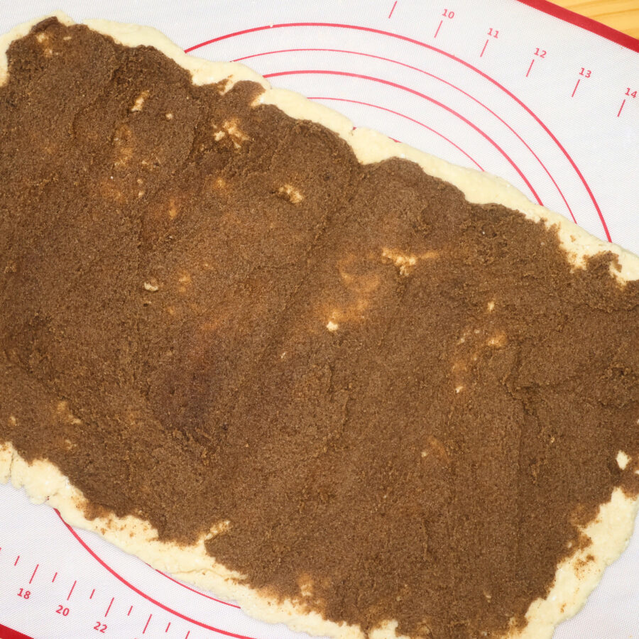 Cottage cheese cinnamon roll dough with brown sugar cinnamon filling spread over the top