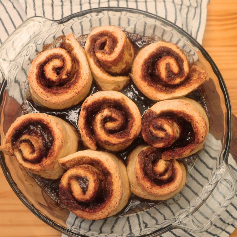 Baked cottage cheese cinnamon rolls in a glass baking dish
