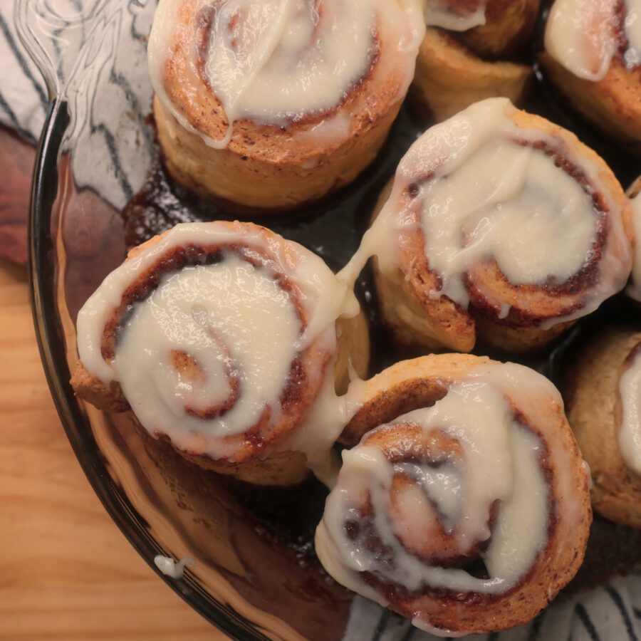 Frosted cottage cheese cinnamon rolls in a baking dish