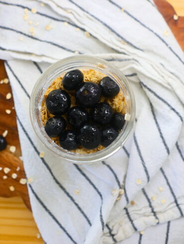 Cottage Cheese Overnight Oats topped with granola and blueberries