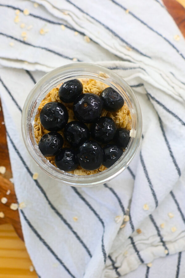 Cottage Cheese Overnight Oats topped with granola and blueberries