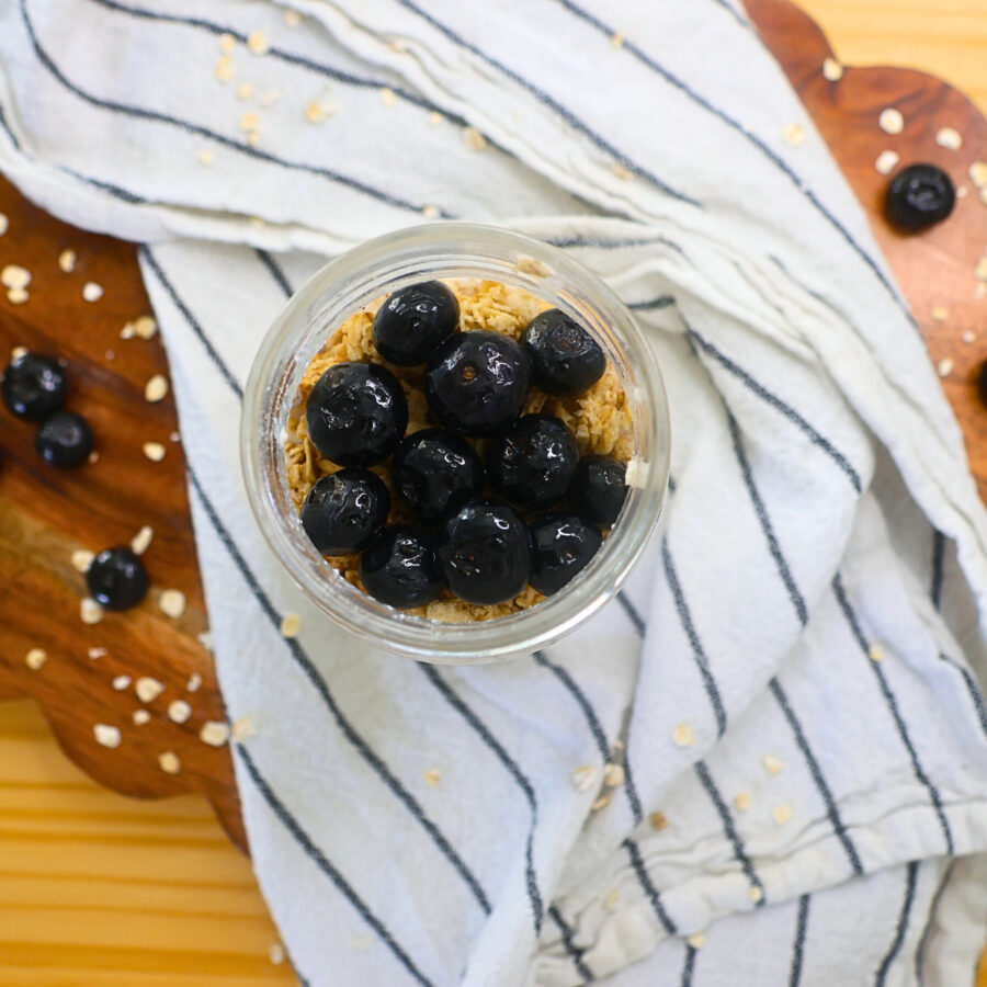 Cottage Cheese Overnight Oats topped with granola and blueberries