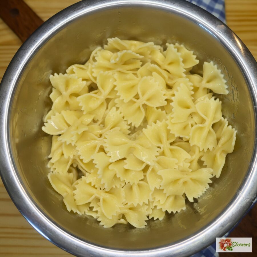 Cooked bowtie pasta in a bowl