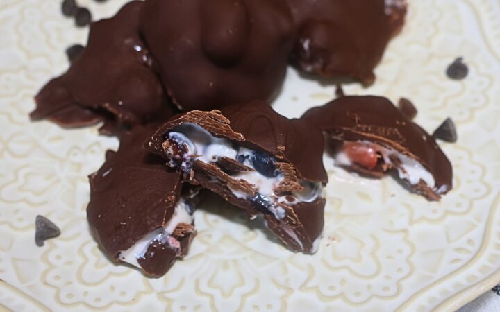 Frozen Yogurt Fruit Clusters with two cut in half on a plate