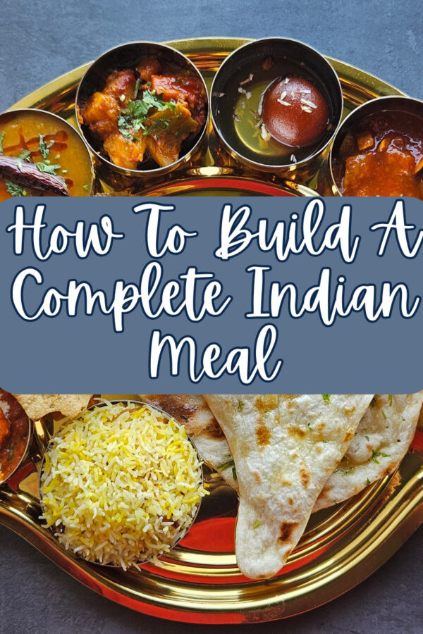 Large Indian Meal on a serving platter with text overlay reading "How To Build A Complete Indian Meal"