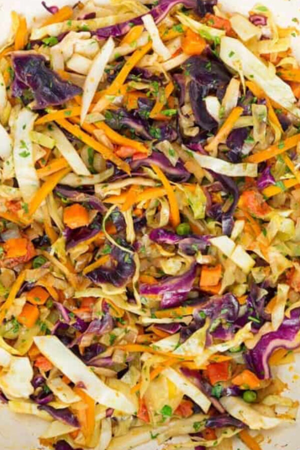 Indian cabbage with peas in a skillet