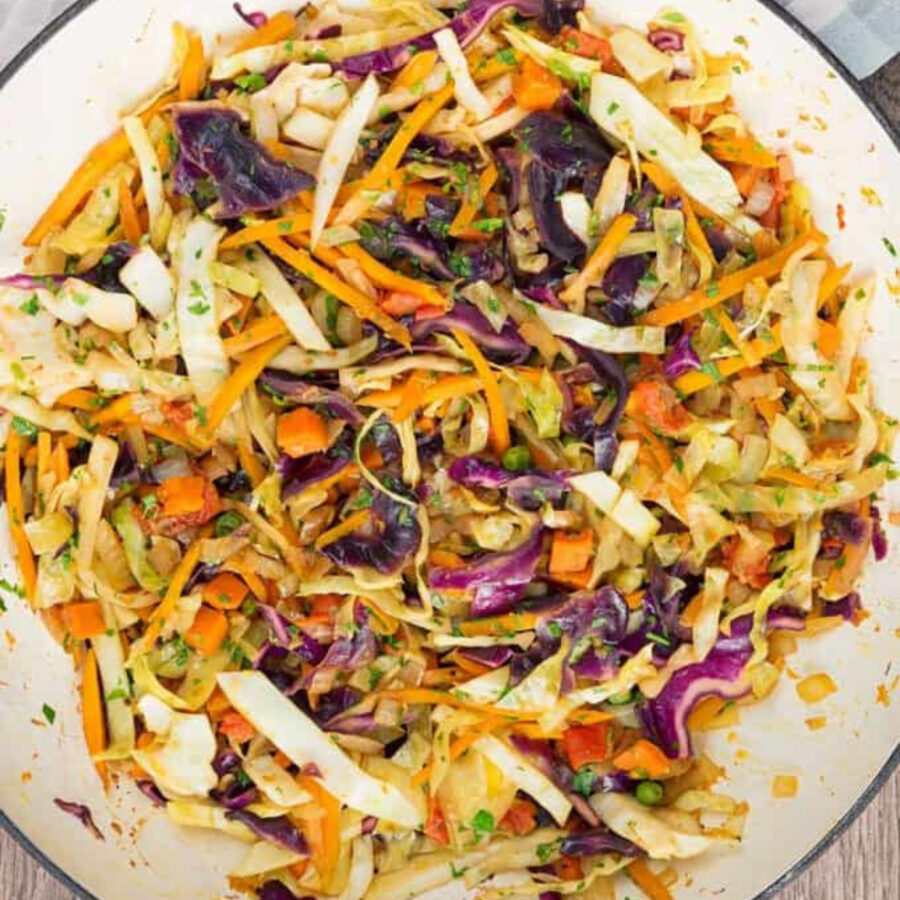 Indian cabbage with peas in a skillet