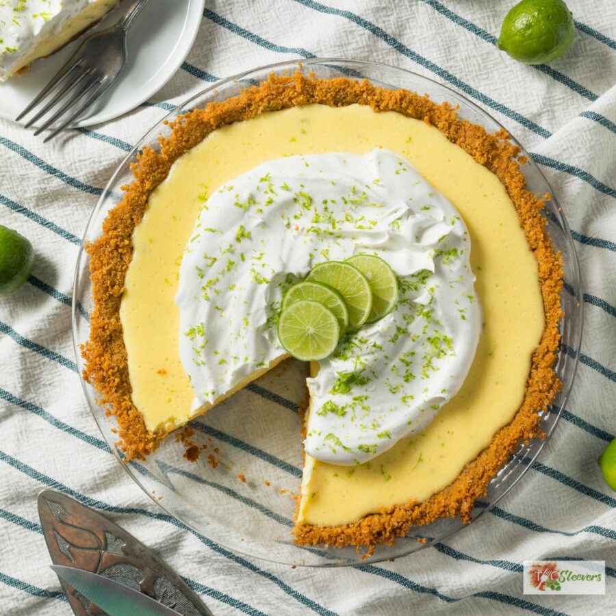 Overhead image of a key lime pie with a slice taken out of it