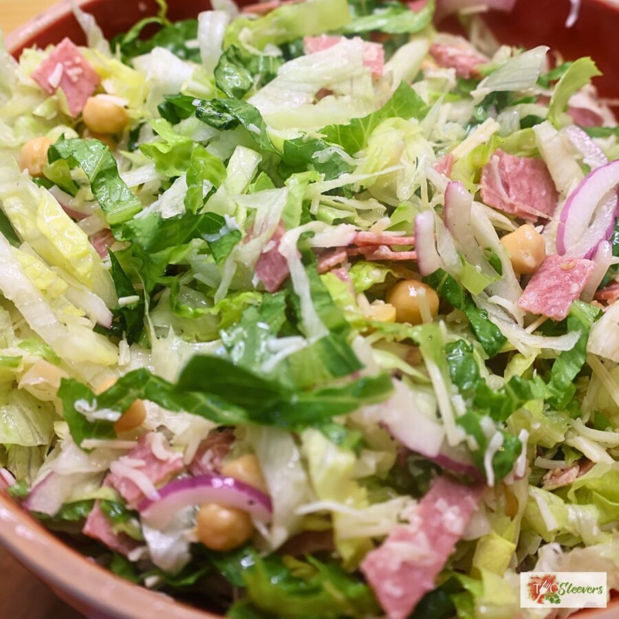 Close up image of La Scala Salad in a red bowl