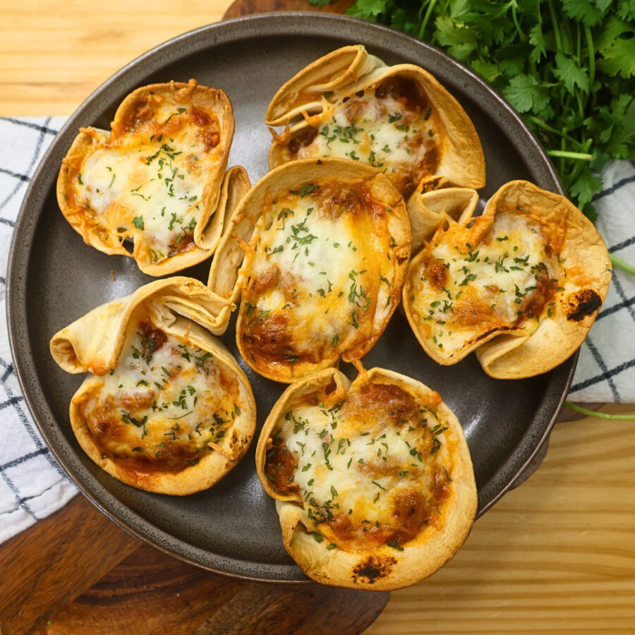 Overhead image of six low carb lasagna cups on a plate