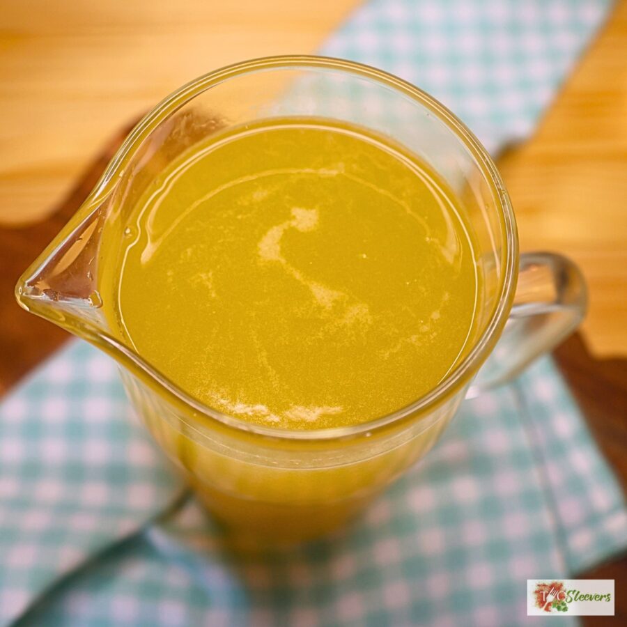 Base of the mango dragonfruit refresher in a glass pitcher