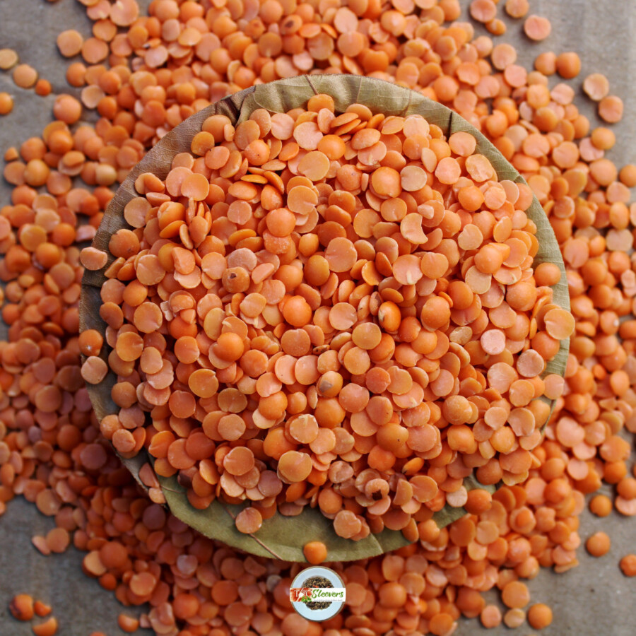 Masoor Dal overflowing from the top of a wooden bowl