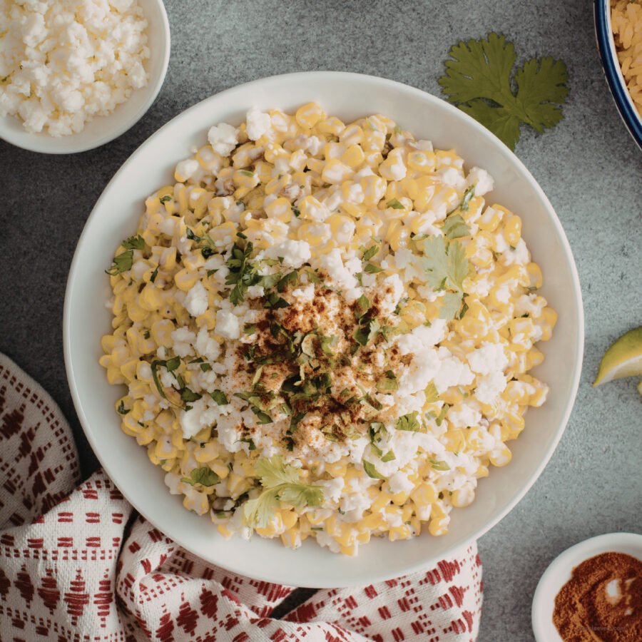 Overhead image of Mexican Street Corn Salad in a white bowl