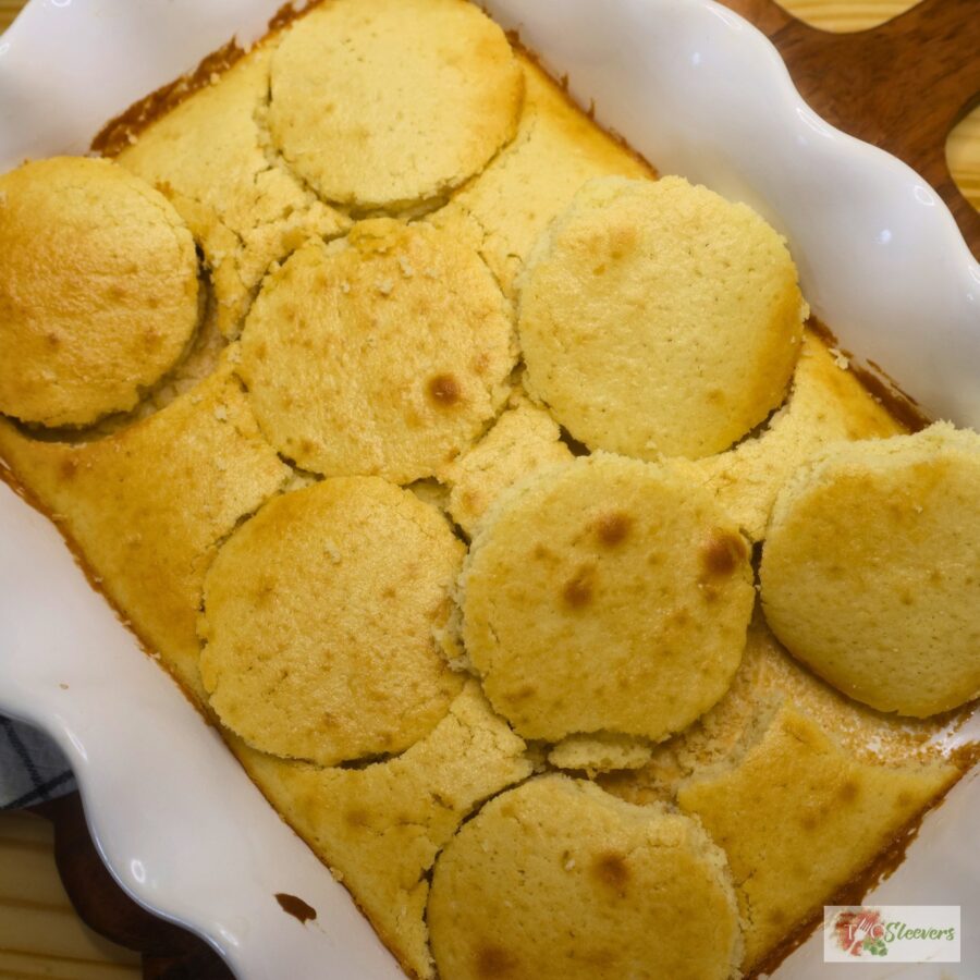 A cake with circles cut out of it in a baking pan