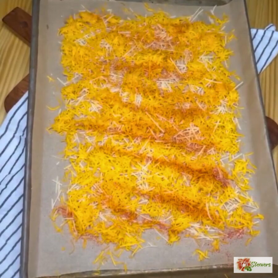 Seasonings sprinkled over shredded cheese