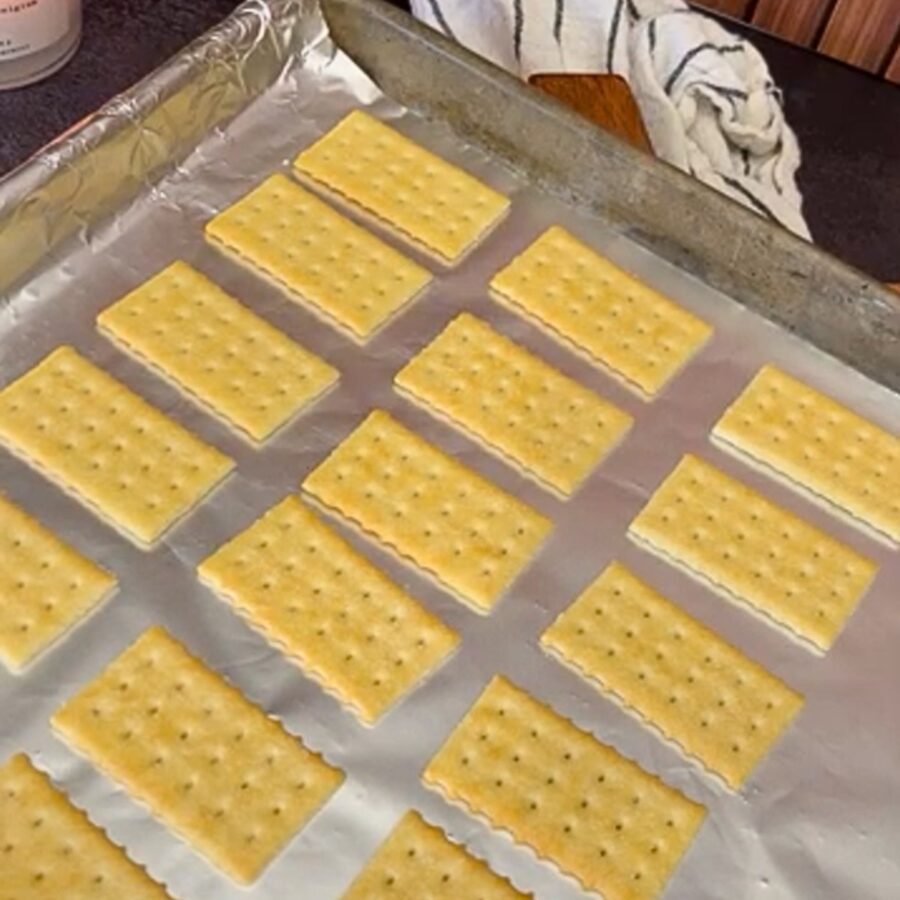 Crackers on a foil lined baking sheet