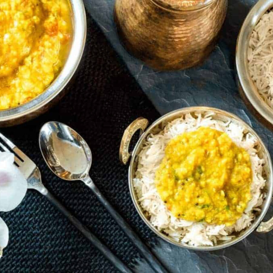 Overhead image of Rice and Dal in serving dishes