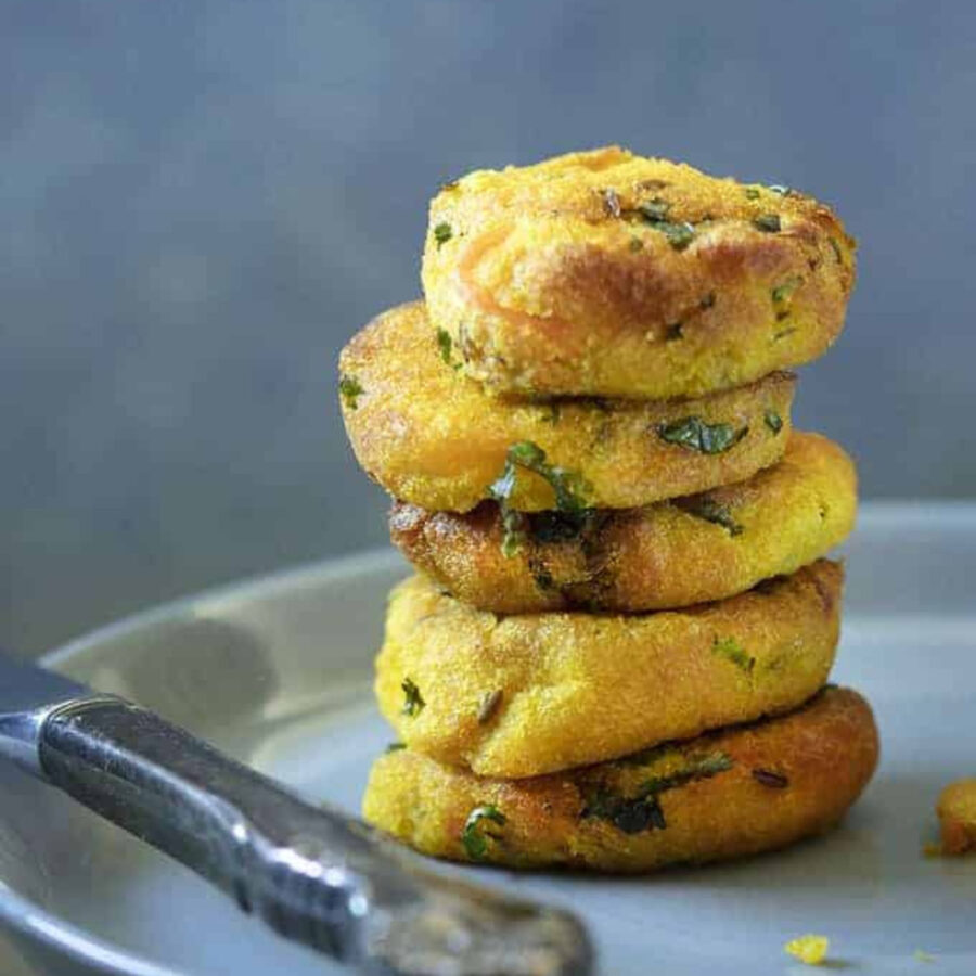 Savory Potato Patties stacked on a plate