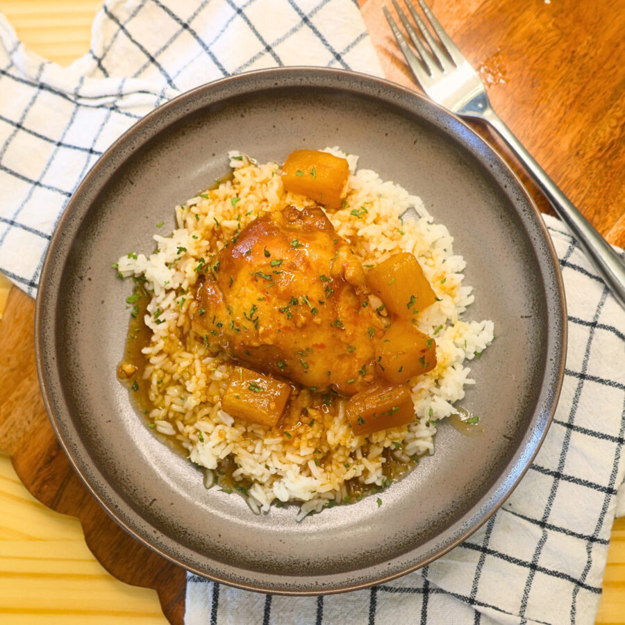 Overhead image of Slow Cooker Hawaiian Chicken over a bed of rice