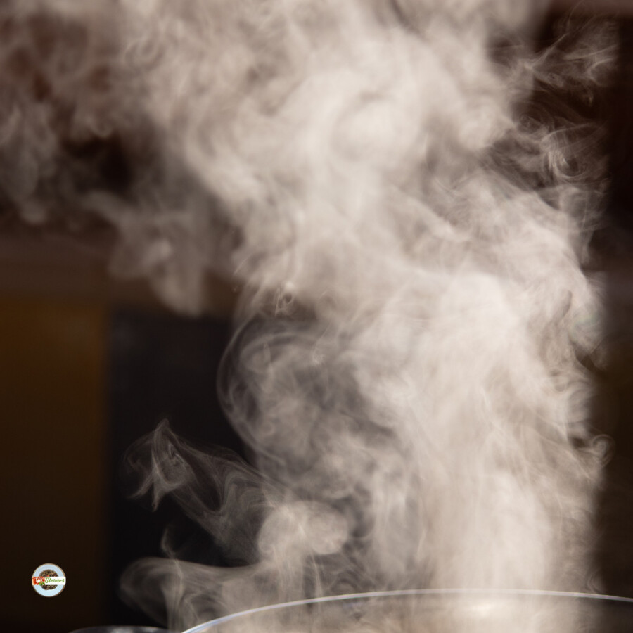 Steam coming out of the top of a pot