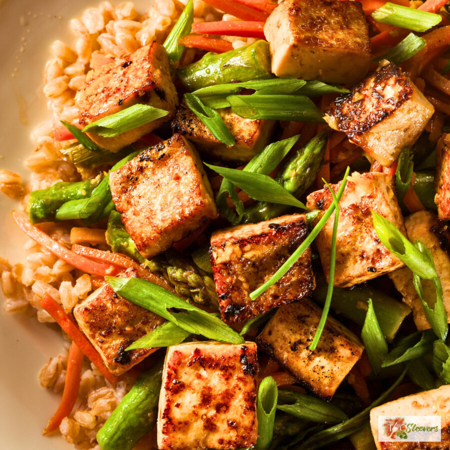 Close up image of Tofu Stir Fry over a bed of rice